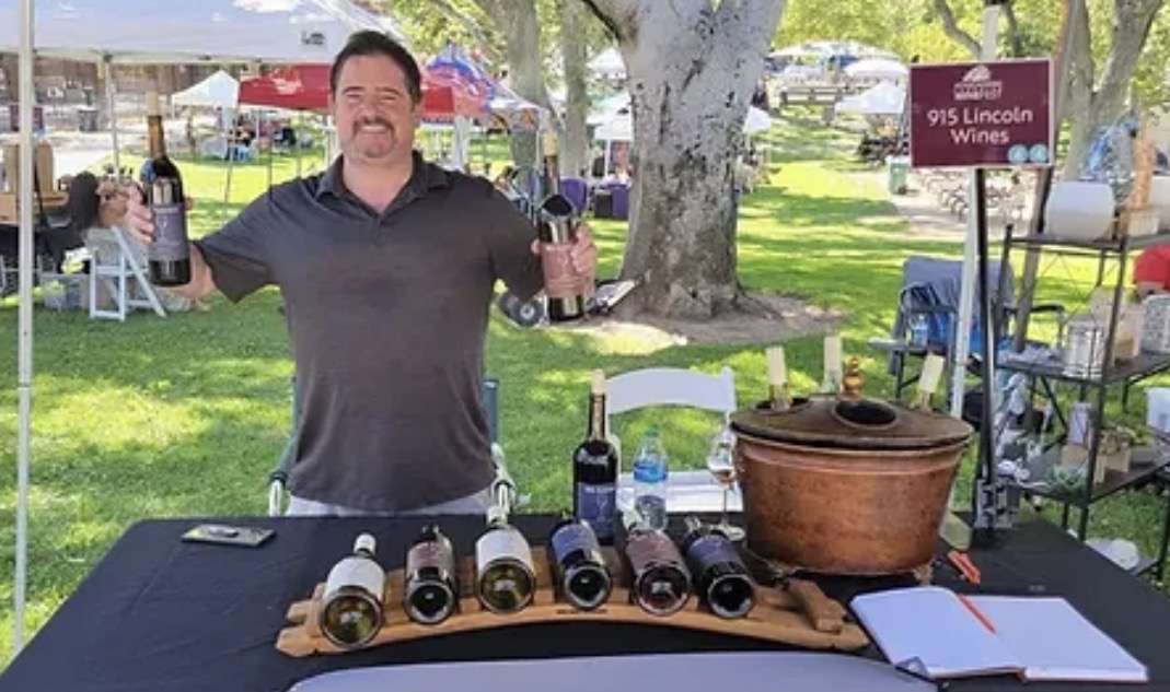 Scott Mathews sharing 915 Lincoln wines at an outdoor tasting
