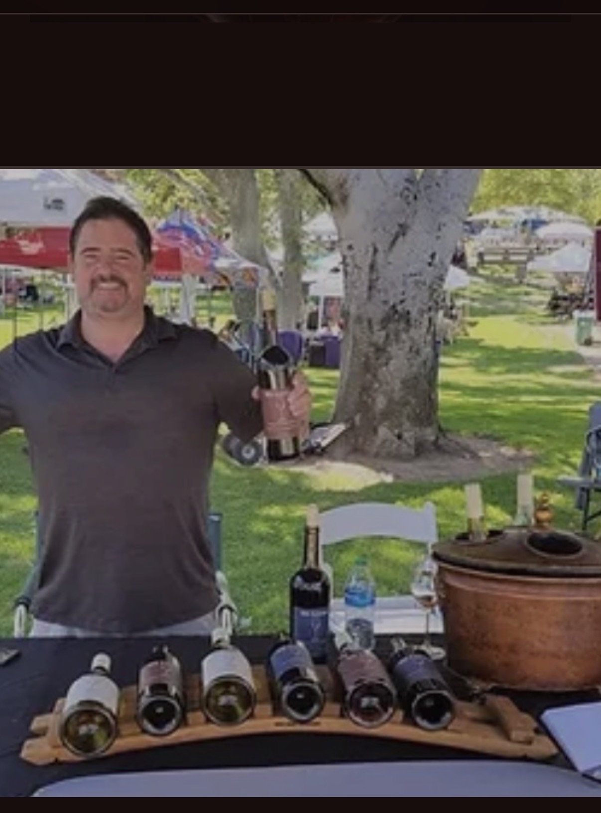 Scott Mathews pouring 915 Lincoln wines at an outdoor festival